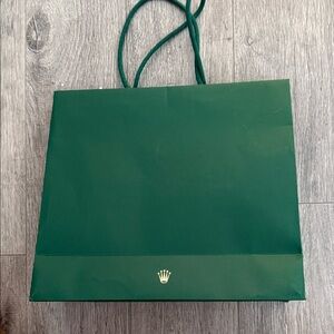 Rolex Green Bag with Gold Emblem